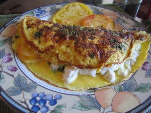 Garden Omelet for Two…With Kale, Tomatoes, Basil, and Goat Cheese